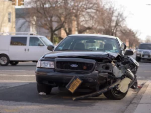 Damaged black car in an accident